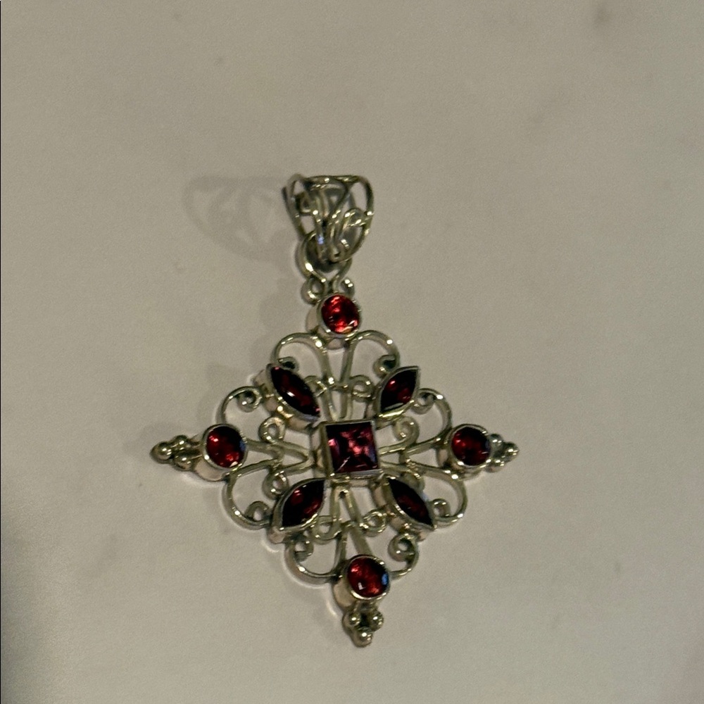 Elegant Silver and Garnet Pendant